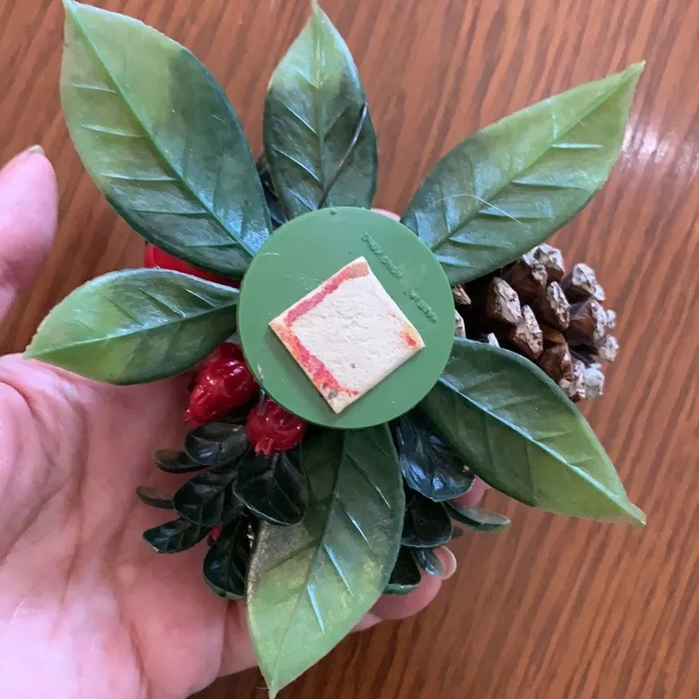 Vintage plastic Christmas corsage with pine‎ cone & holly berries